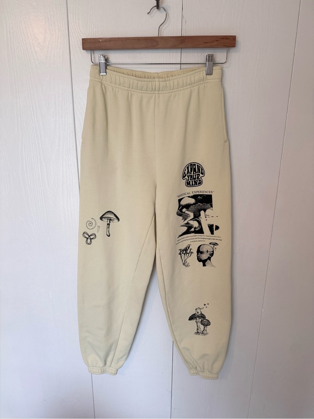 TNA Cream Graphic Track Joggers